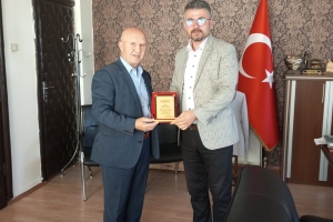 AFADER'DEN BAŞKAN YARDIMCISI KAYA'YA PLAKET