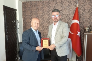 AFADER'DEN BAŞKAN YARDIMCISI KAYA'YA PLAKET